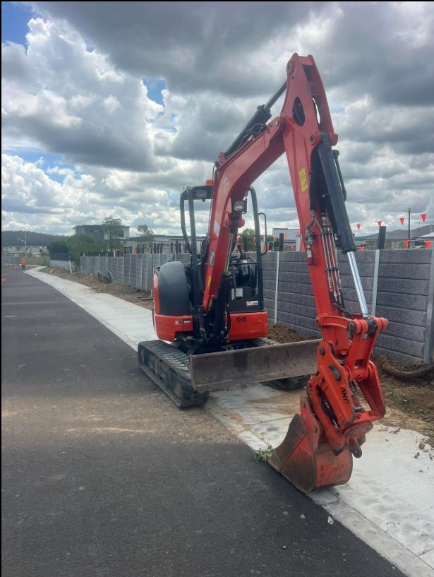 The Kubota on footpath works