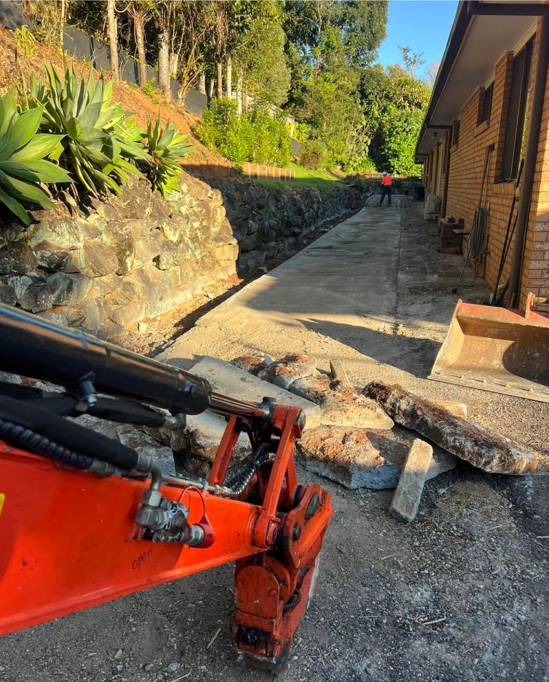 Rock wall along a driveway cut